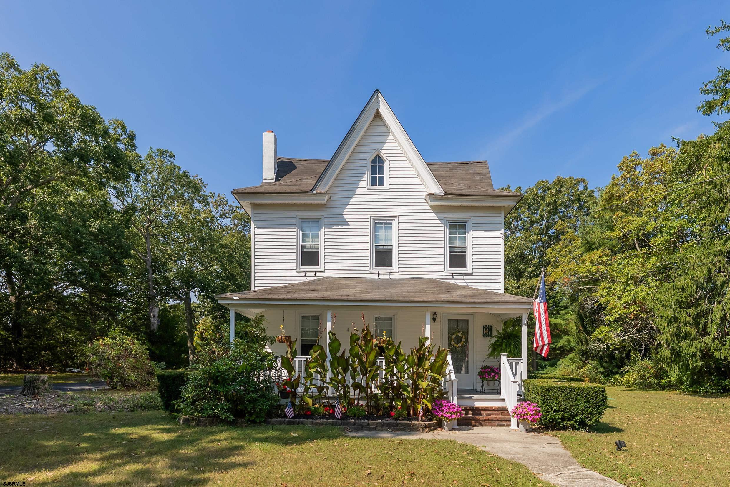 225 Chestnut Neck Road Port Republic, NJ 08241 - Photo 23 of 29 a front view of a house with garden