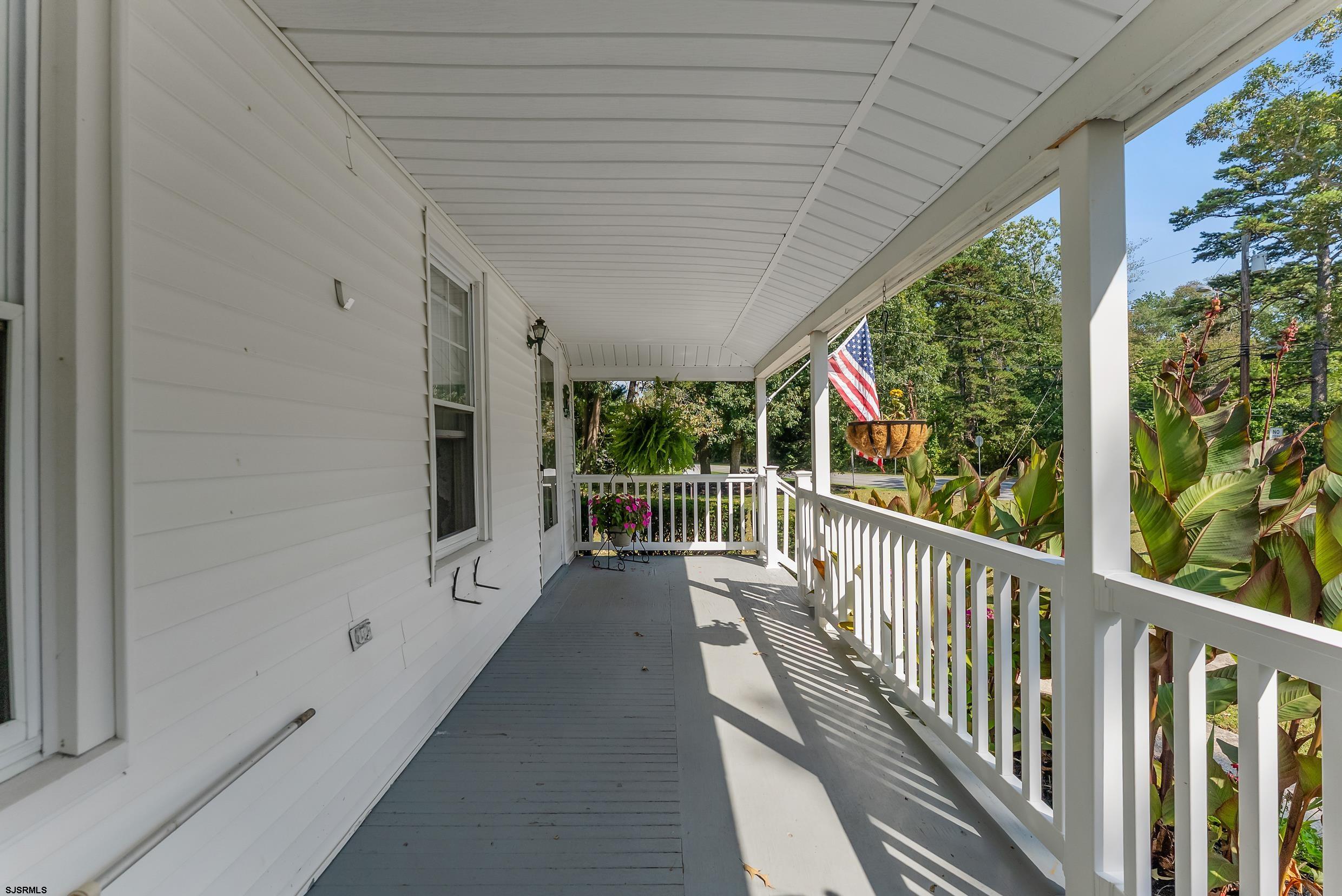 225 Chestnut Neck Road Port Republic, NJ 08241 - Photo 3 of 29 a view of a porch