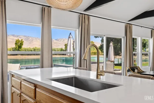 a view of swimming pool from a hallway