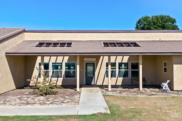 a room with furniture and a window