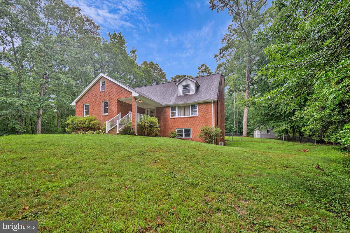 7185 Hawthorne Road La Plata, MD 20646 - Photo 3 of 59 Charming brick home in lush greenery.
