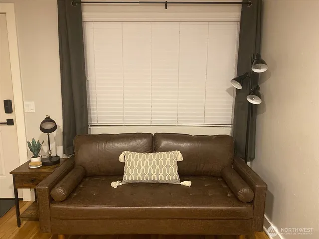 a view of a workspace with furniture