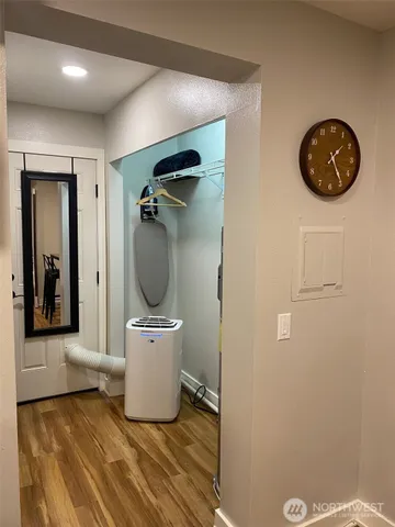 a bathroom with a glass shower door