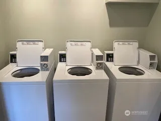 a room with gym equipment and a large window