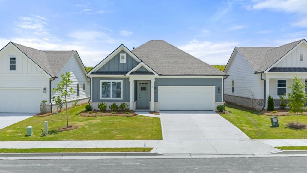 64 Lakeview Point Dallas, GA 30157 - Photo 1 of 1 a view of house that has a big yard and large trees