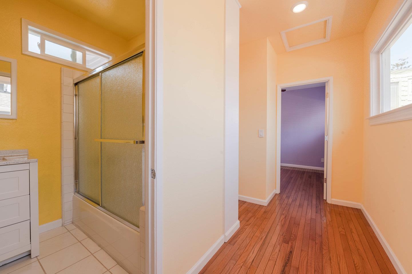 271 Everett Avenue Campbell, CA 95008 - Photo 19 of 32 a view of a hallway with wooden floor