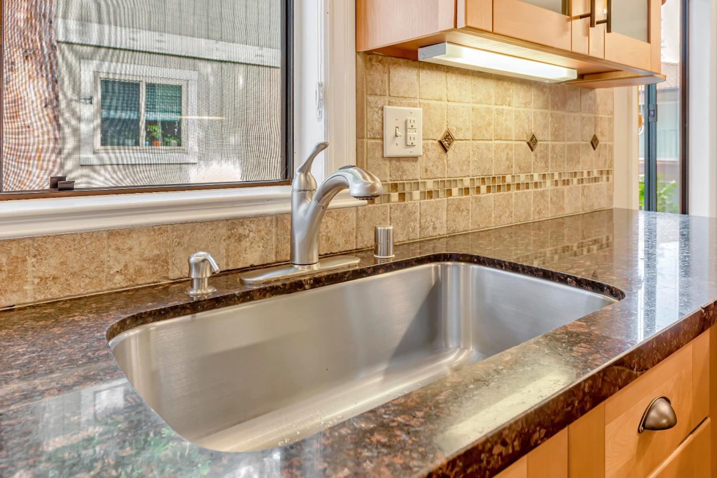 47 Dot Avenue, Unit A Campbell, CA 95008 - Photo 11 of 31 a bathroom with a granite countertop sink and mirror