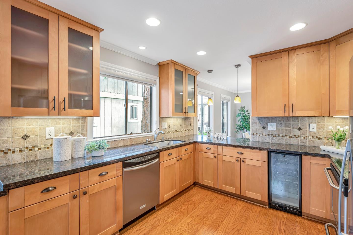 47 Dot Avenue, Unit A Campbell, CA 95008 - Photo 13 of 31 a kitchen with a sink stove and cabinets