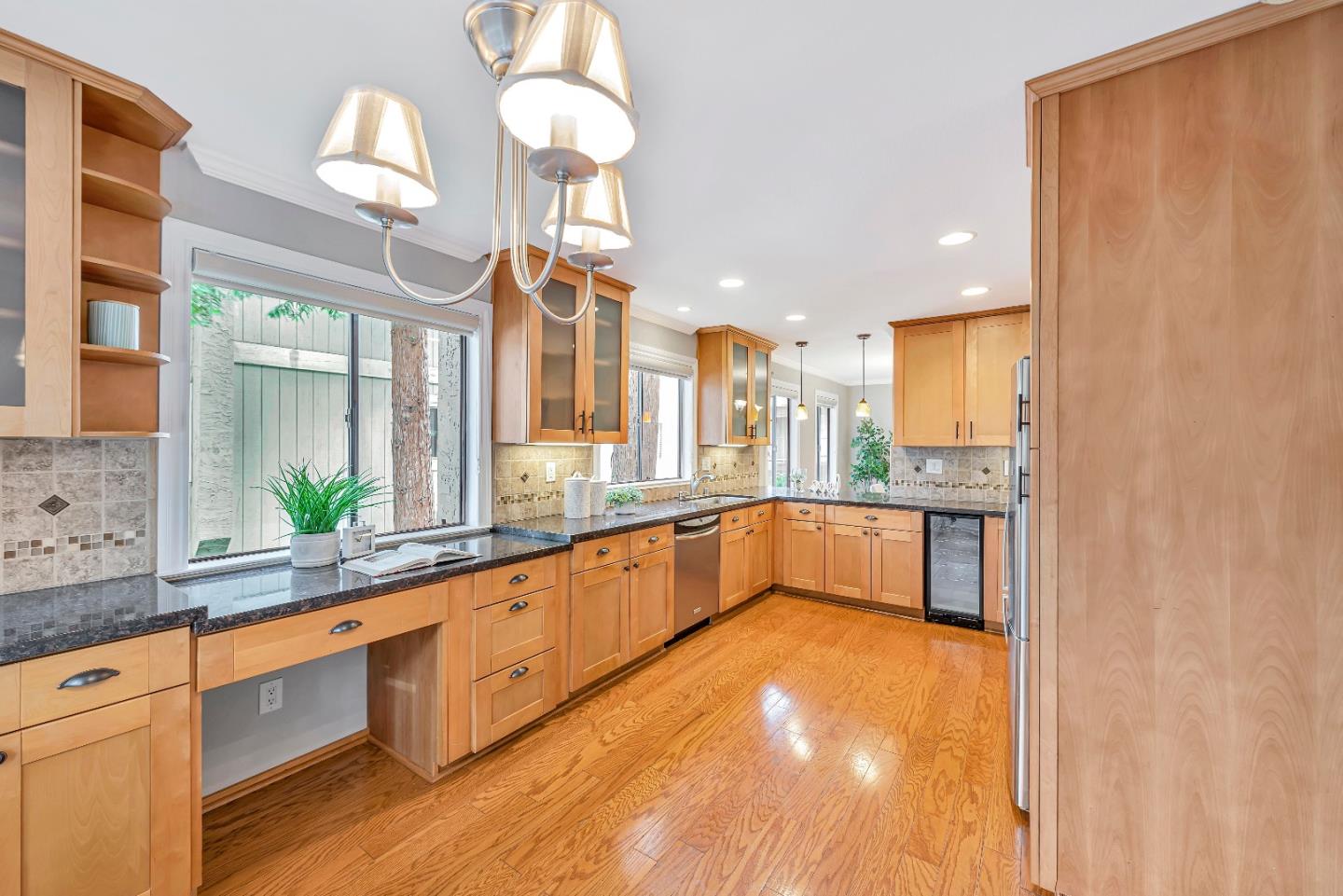 47 Dot Avenue, Unit A Campbell, CA 95008 - Photo 14 of 31 a large white kitchen with a large window stainless steel appliances and cabinets