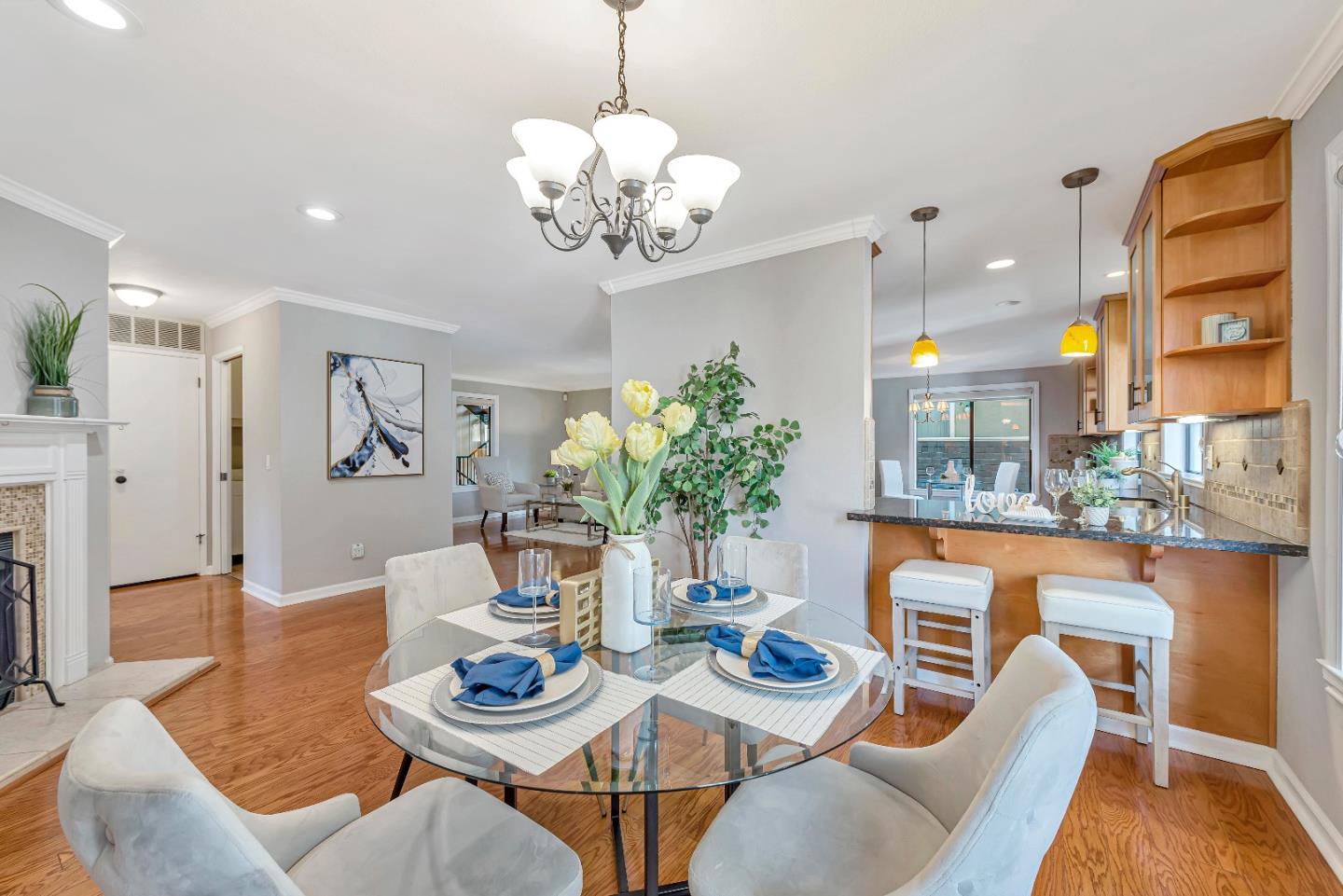 47 Dot Avenue, Unit A Campbell, CA 95008 - Photo 20 of 31 a view of a dining room with furniture a chandelier and wooden floor