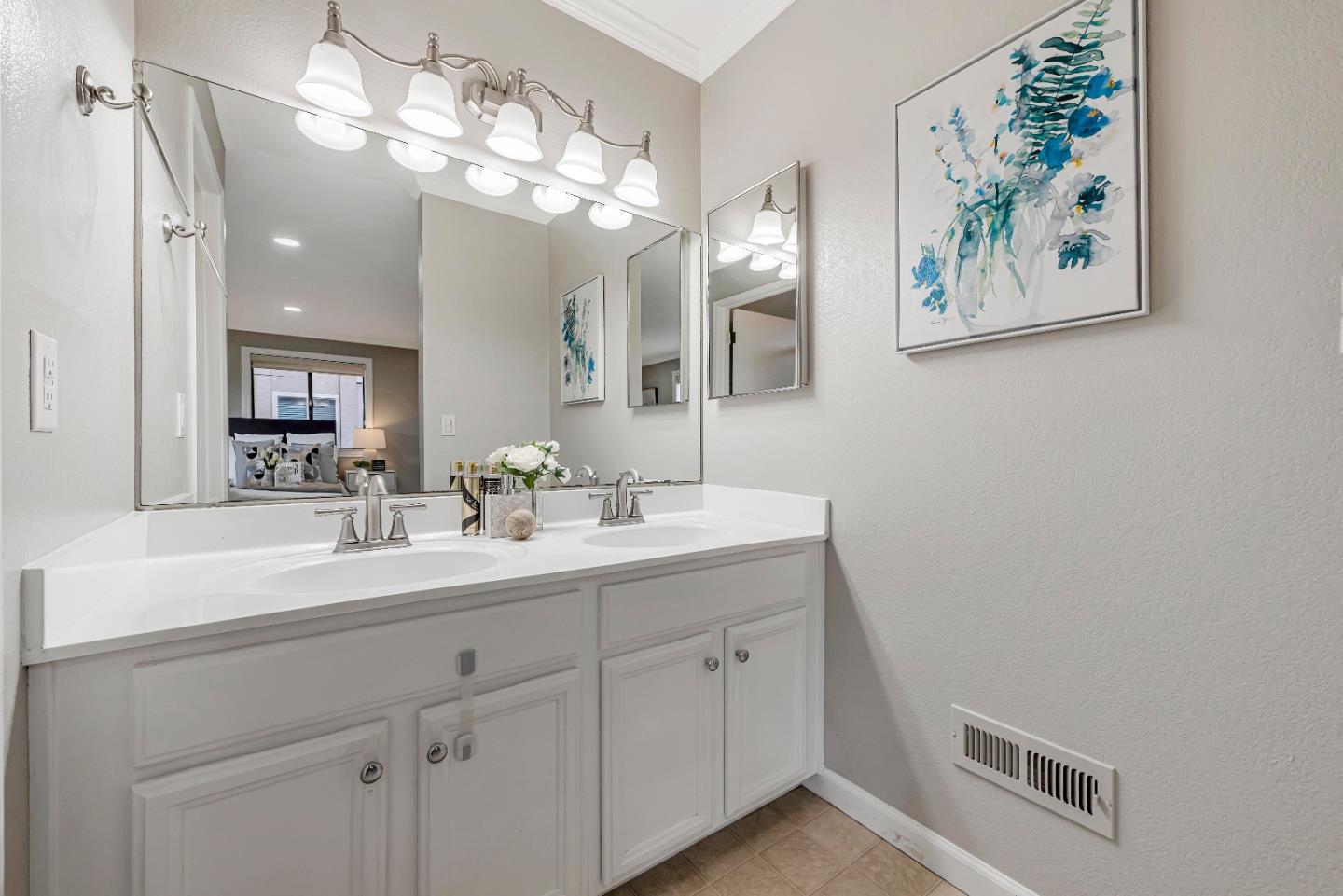 47 Dot Avenue, Unit A Campbell, CA 95008 - Photo 25 of 31 a bathroom with a double vanity sink and a mirror