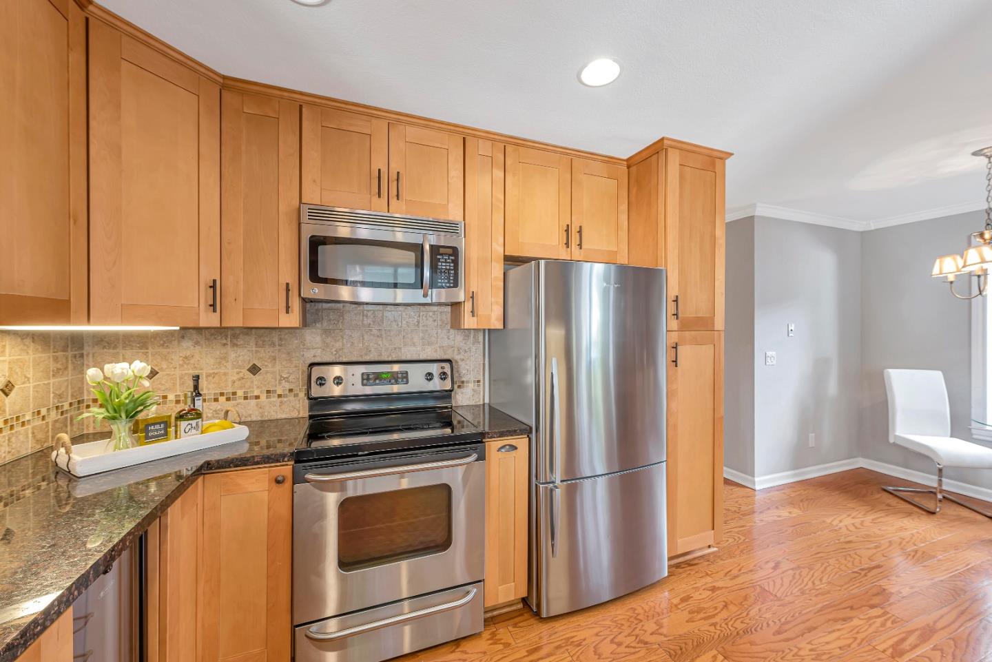 47 Dot Avenue, Unit A Campbell, CA 95008 - Photo 7 of 31 a kitchen with a refrigerator sink and microwave
