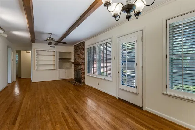 a view of a livingroom with wooden floor