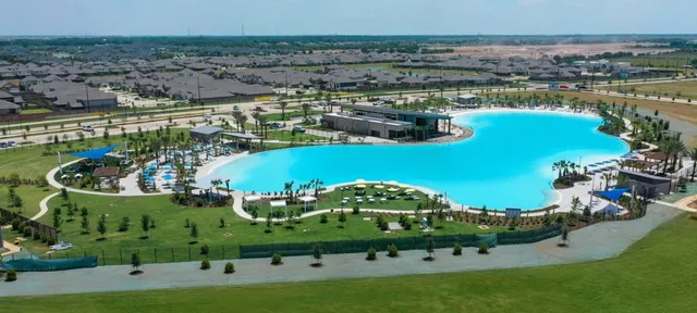 a view of a city with lawn chairs