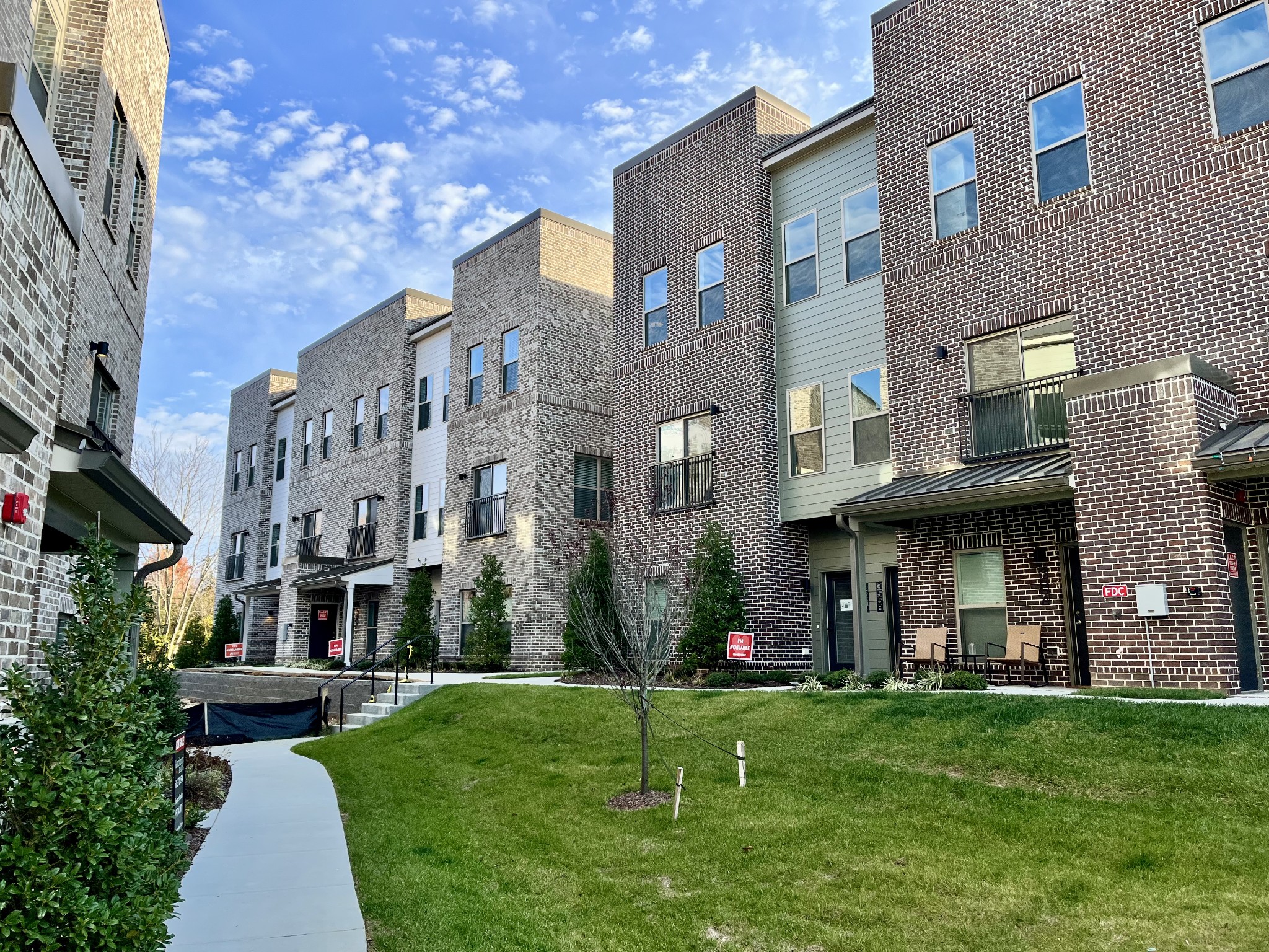 a view of a building with a garden