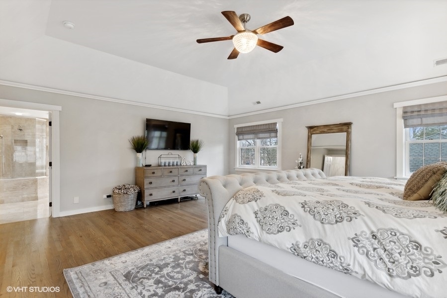 134 West 59th Street Burr Ridge, IL 60527 - Photo 19 of 41 a bedroom with a bed and a couch