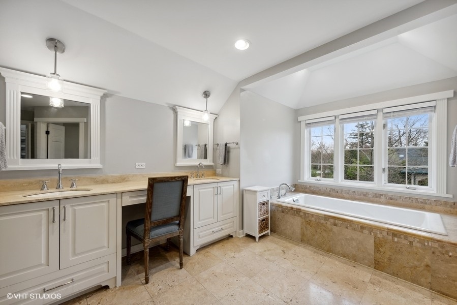 134 West 59th Street Burr Ridge, IL 60527 - Photo 20 of 41 a large white kitchen with sink and cabinets