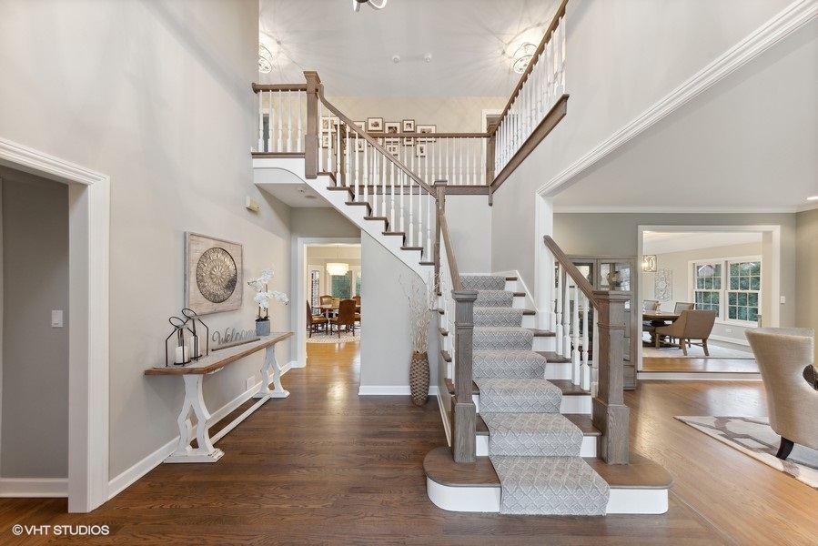 134 West 59th Street Burr Ridge, IL 60527 - Photo 2 of 41 a view of entryway and hall with wooden floor