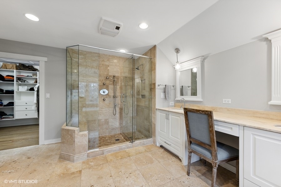 134 West 59th Street Burr Ridge, IL 60527 - Photo 21 of 41 a bathroom with a granite countertop sink a toilet and shower