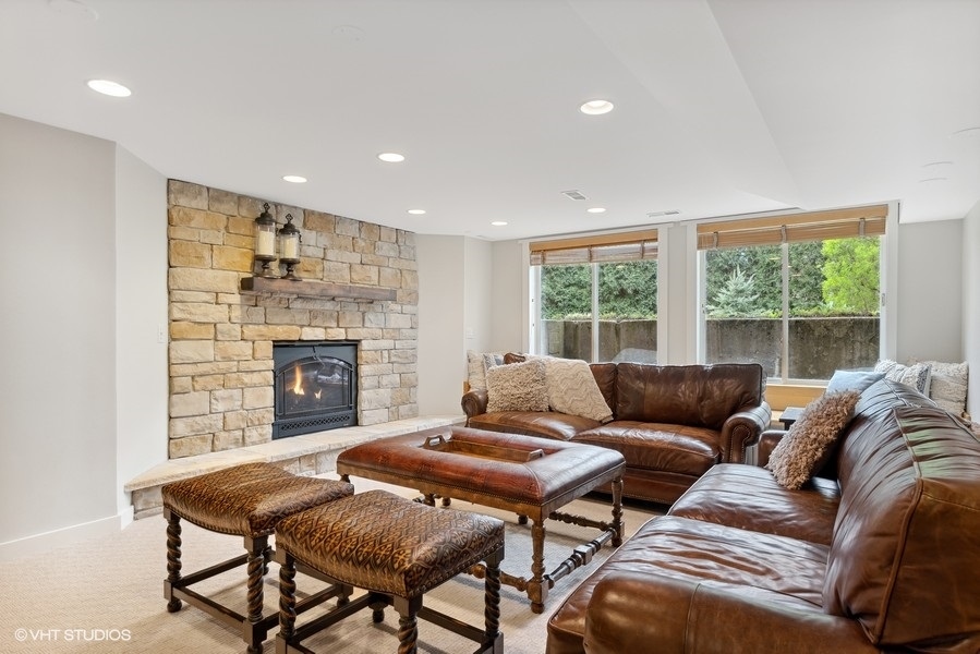 134 West 59th Street Burr Ridge, IL 60527 - Photo 27 of 41 a living room with furniture and a fireplace