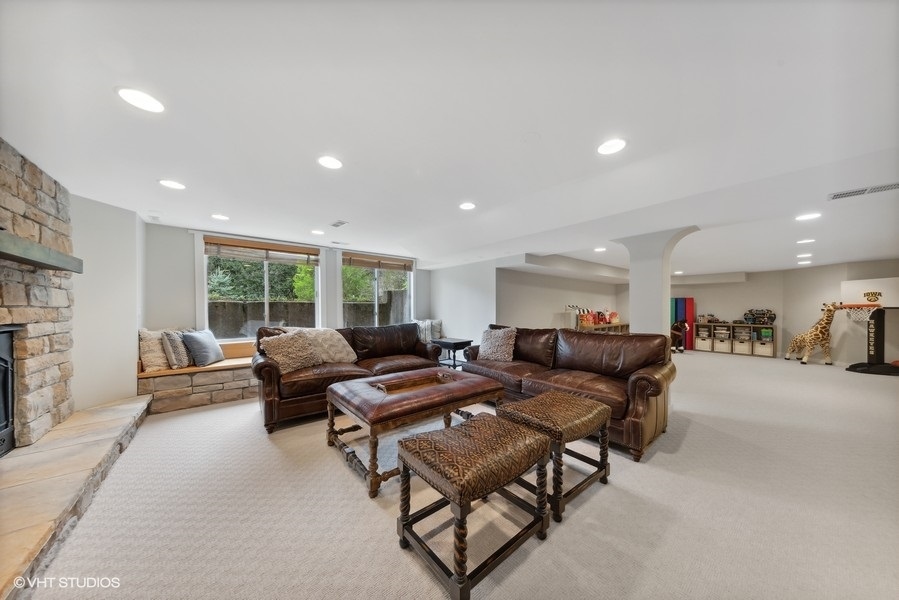 134 West 59th Street Burr Ridge, IL 60527 - Photo 28 of 41 a living room with furniture and a large window