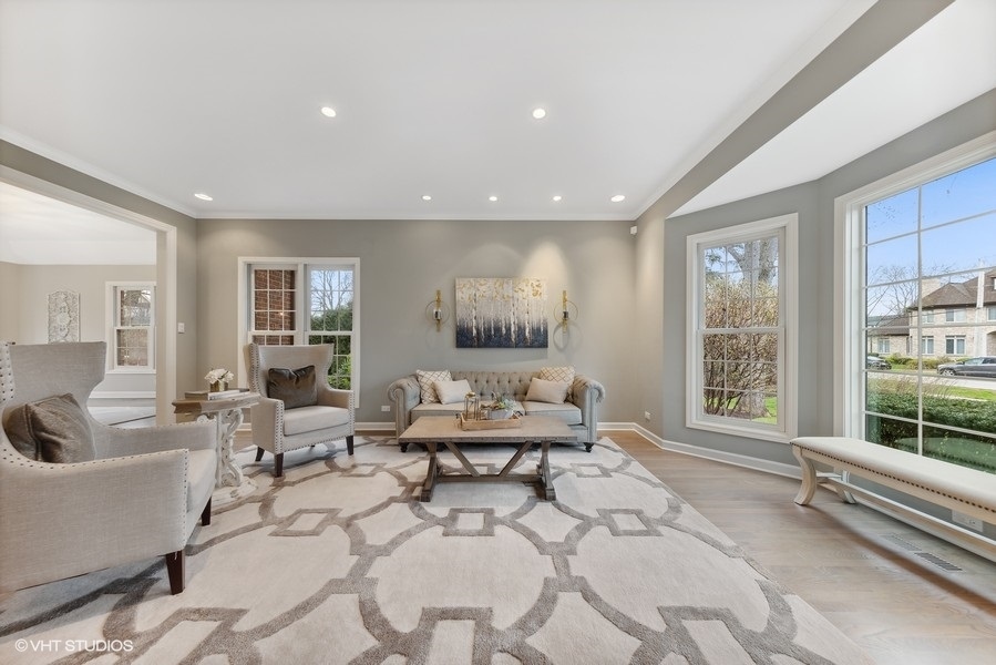 134 West 59th Street Burr Ridge, IL 60527 - Photo 3 of 41 a living room with furniture and a large window