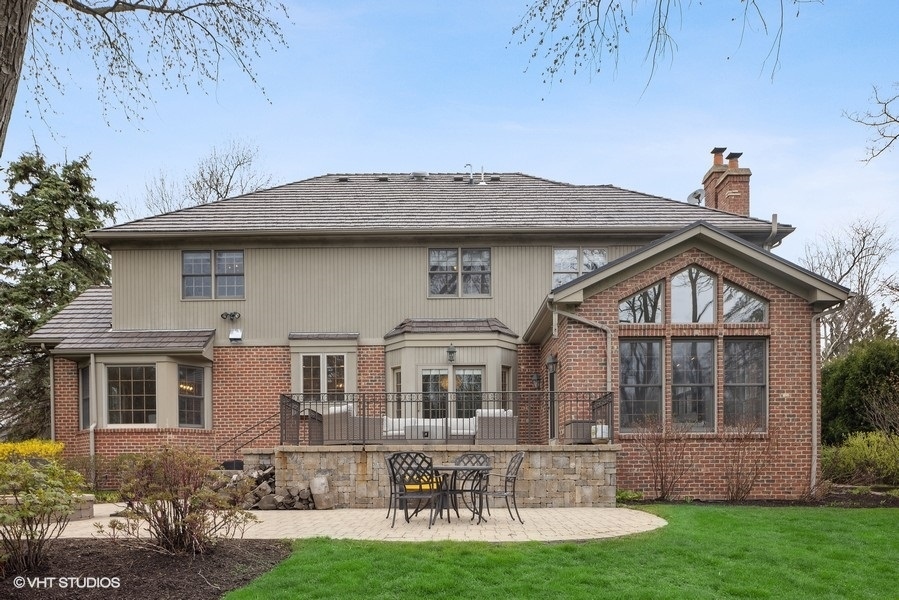 134 West 59th Street Burr Ridge, IL 60527 - Photo 36 of 41 a front view of a house with a yard