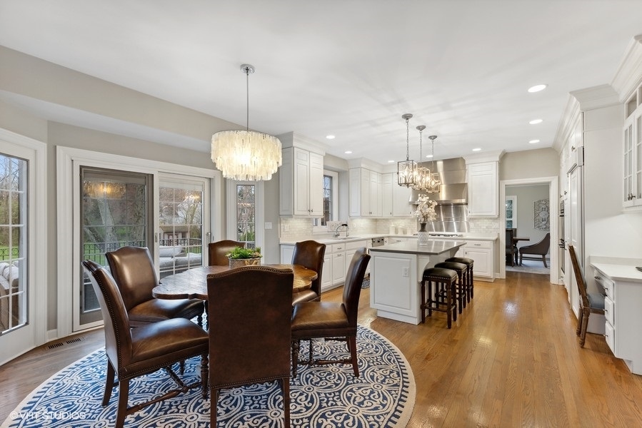 134 West 59th Street Burr Ridge, IL 60527 - Photo 10 of 41 a view of a dining room with furniture window and wooden floor