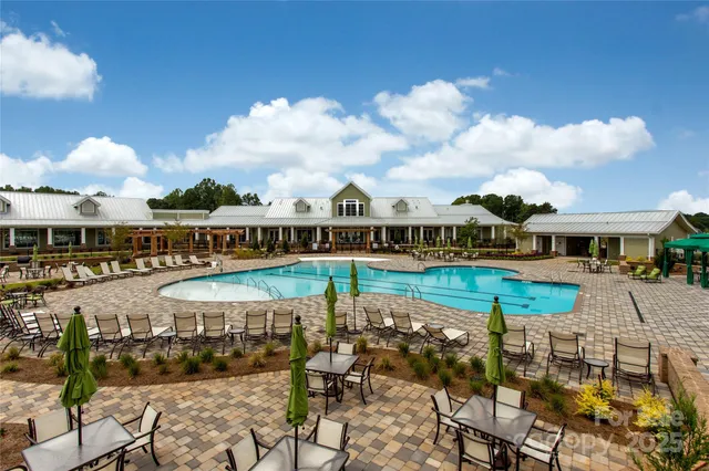 a view of a house with a swimming pool