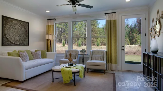 a front view of a house with swimming pool and seating space