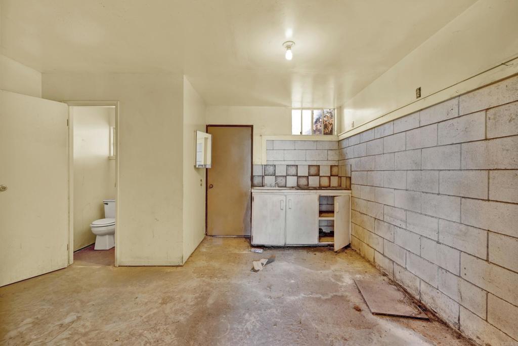29345 Wilkes Road Valley Center, CA 92082 - Photo 26 of 63 a view of a storage & utility room with a fridge