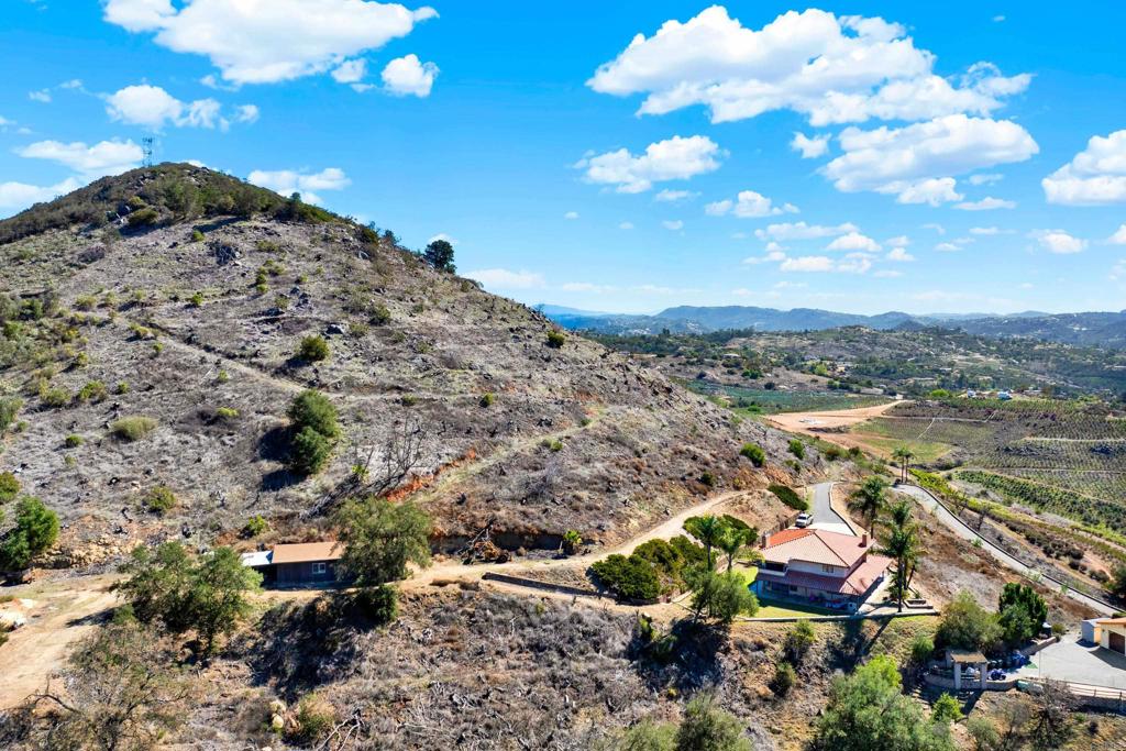 29345 Wilkes Road Valley Center, CA 92082 - Photo 5 of 63 a view of a lake with a mountain in the background