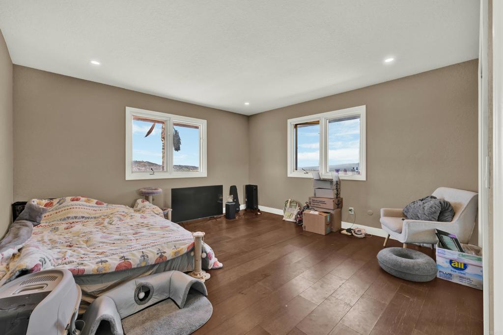 29345 Wilkes Road Valley Center, CA 92082 - Photo 52 of 63 a bedroom with furniture and a window