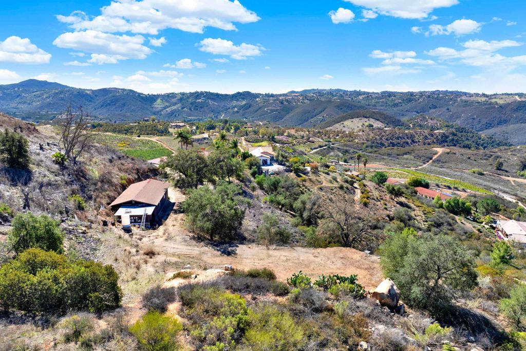 29345 Wilkes Road Valley Center, CA 92082 - Photo 7 of 63 a view of a mountain with an outdoor space and mountain view in back