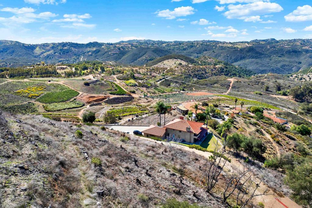 29345 Wilkes Road Valley Center, CA 92082 - Photo 8 of 63 an aerial view of residential house and sandy dunes