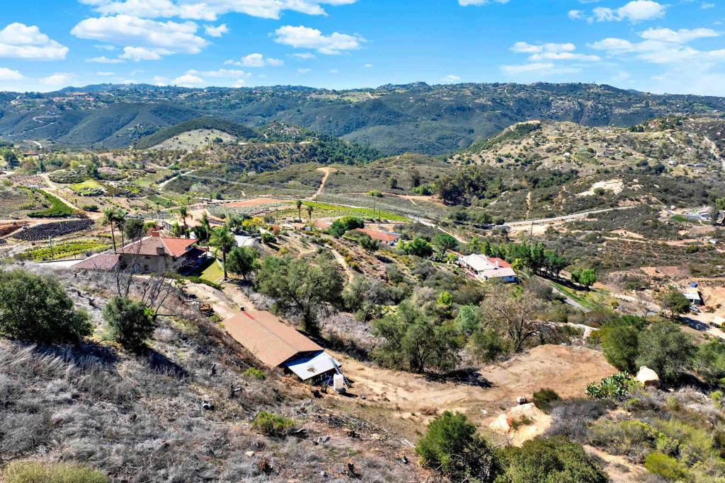 29345 Wilkes Road Valley Center, CA 92082 - Photo 9 of 63 a view of a city with mountains in the background