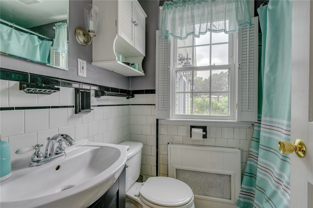 31 Edgehill Road Warwick, RI 02889 - Photo 16 of 30 1st floor bathroom with shower and tub.