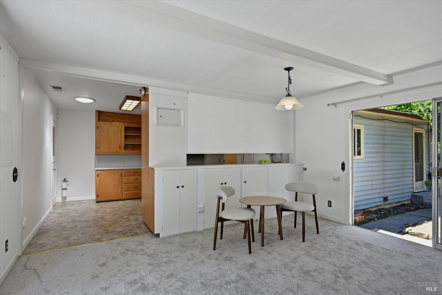 4941 Hansen Drive Santa Rosa, CA 95409 - Photo 13 of 35 Dining area with some built-in cabinets for storage is just off of the kitchen