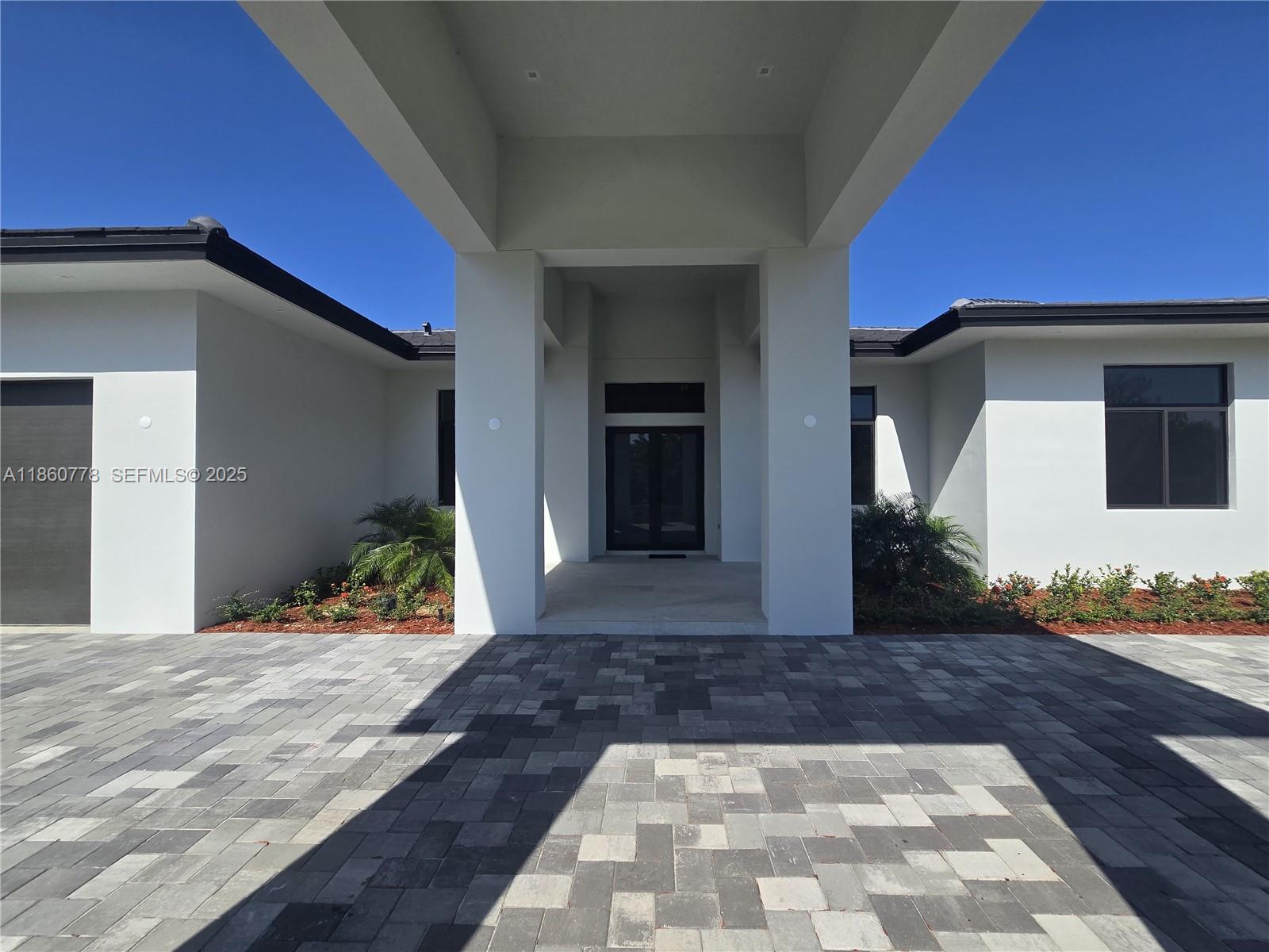 23840 Southwest 209th Place Homestead, FL 33031 - Photo 22 of 89 a view of a house with a yard