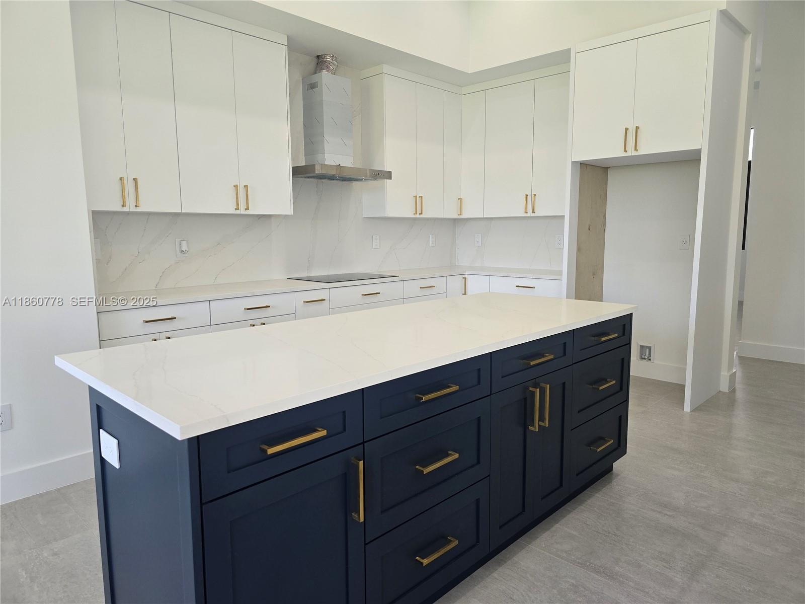 23840 Southwest 209th Place Homestead, FL 33031 - Photo 55 of 89 a kitchen with a sink cabinets and white appliances