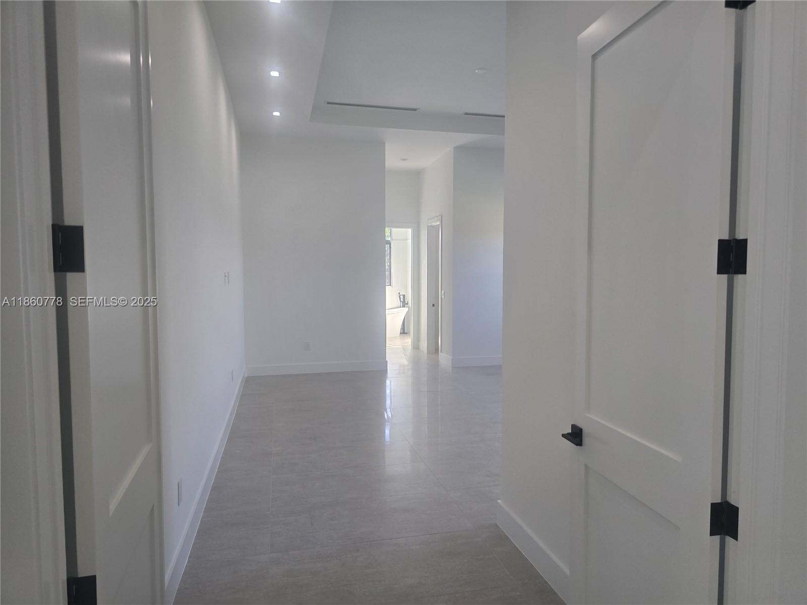 23840 Southwest 209th Place Homestead, FL 33031 - Photo 67 of 89 a view of hallway with closet