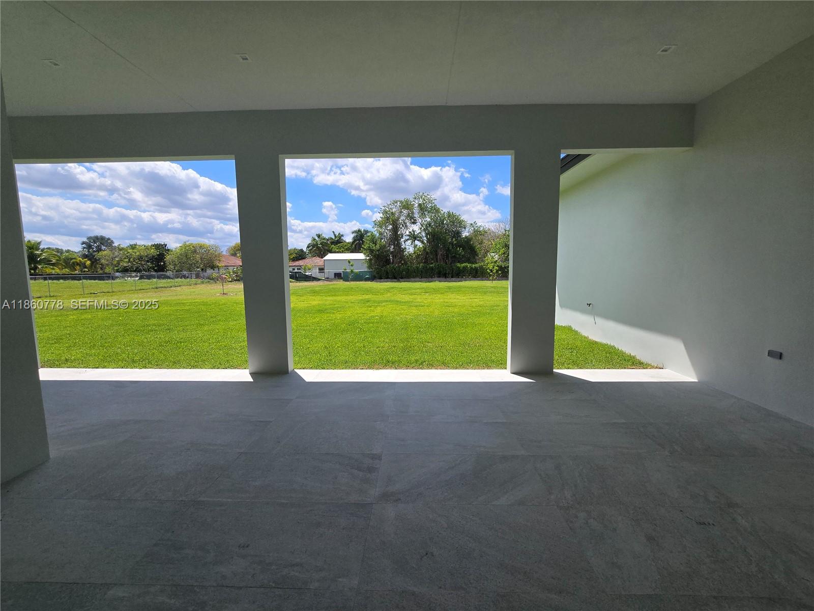 23840 Southwest 209th Place Homestead, FL 33031 - Photo 78 of 89 a view of a green field