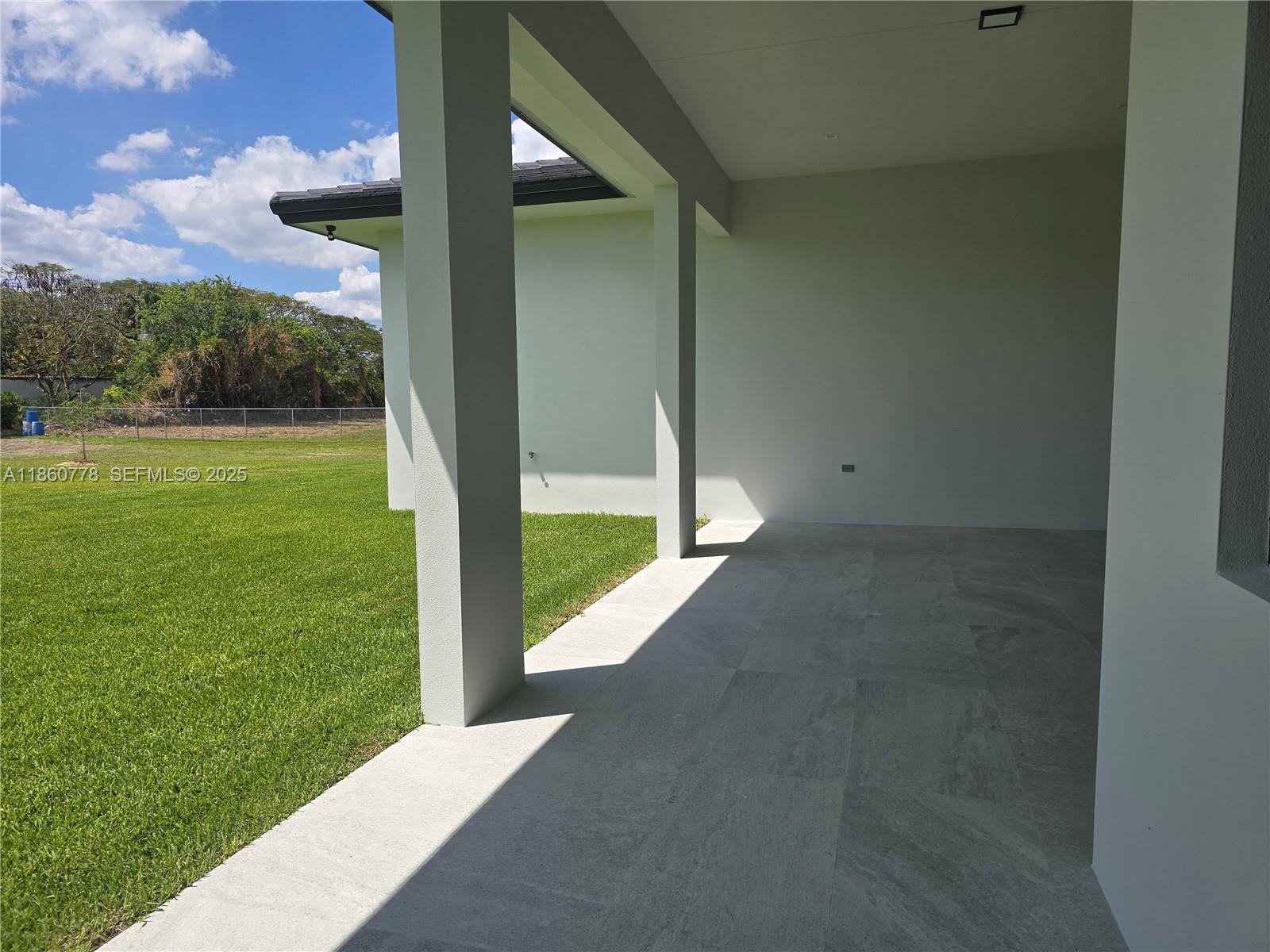 23840 Southwest 209th Place Homestead, FL 33031 - Photo 80 of 89 a view of an outdoor space and a yard