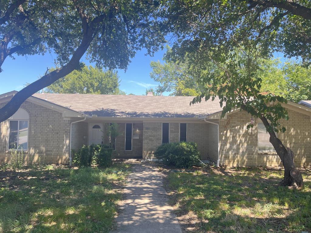 575 Manco Road, Unit A Lewisville, TX 75067 - Photo 2 of 9 a front view of house with yard and green space