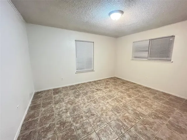 an empty room with a workbench