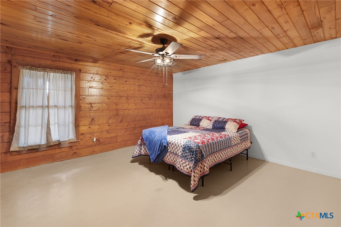 124 Old Mission Road Kempner, TX 76539 - Photo 20 of 39 a spacious bedroom with a bed and a window