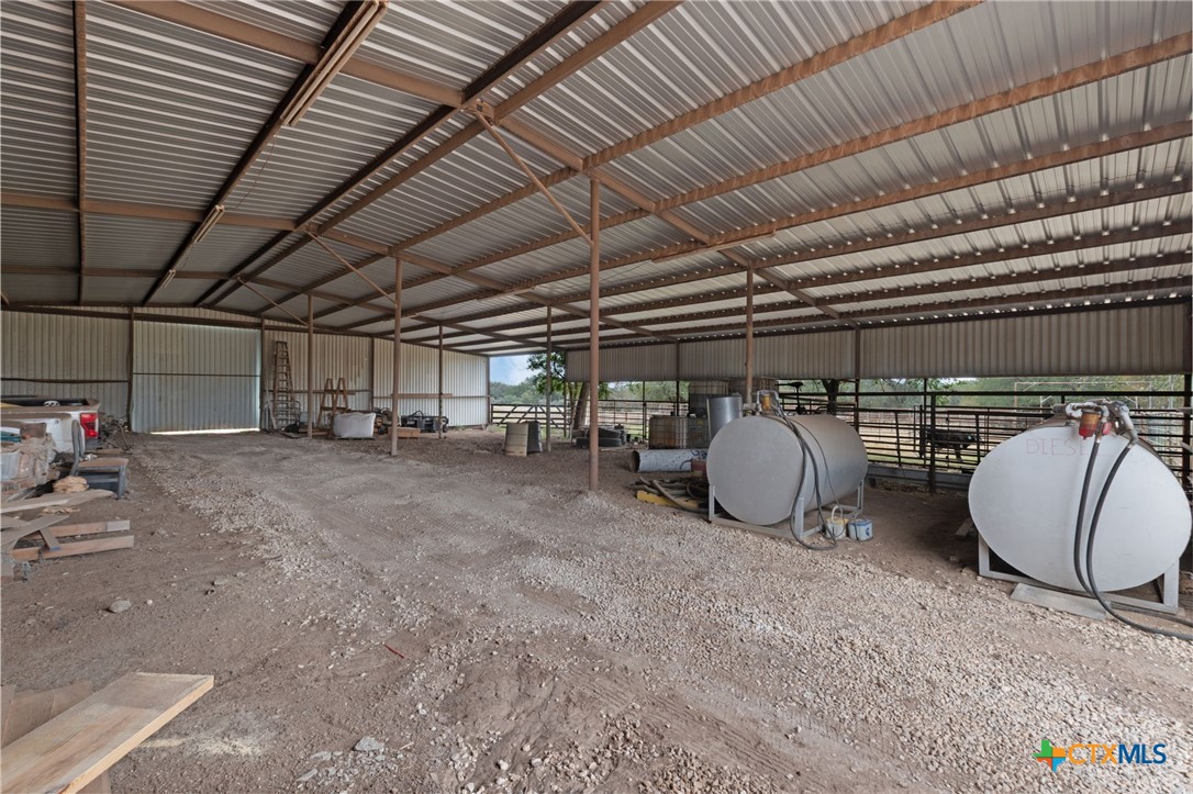 124 Old Mission Road Kempner, TX 76539 - Photo 29 of 39 a view of a garage with table and chairs