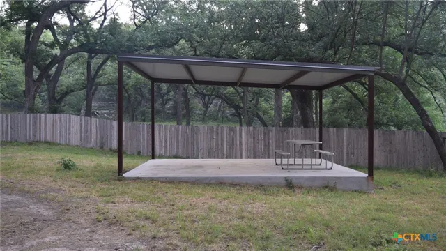 a view of a lake with green space