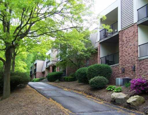 555 Sloop Road, Unit 16 Pittsburgh, PA 15237 - Photo 1 of 18 Exterior Front. Main entrance from a shaded drive welcomes guests through a secure lobby.