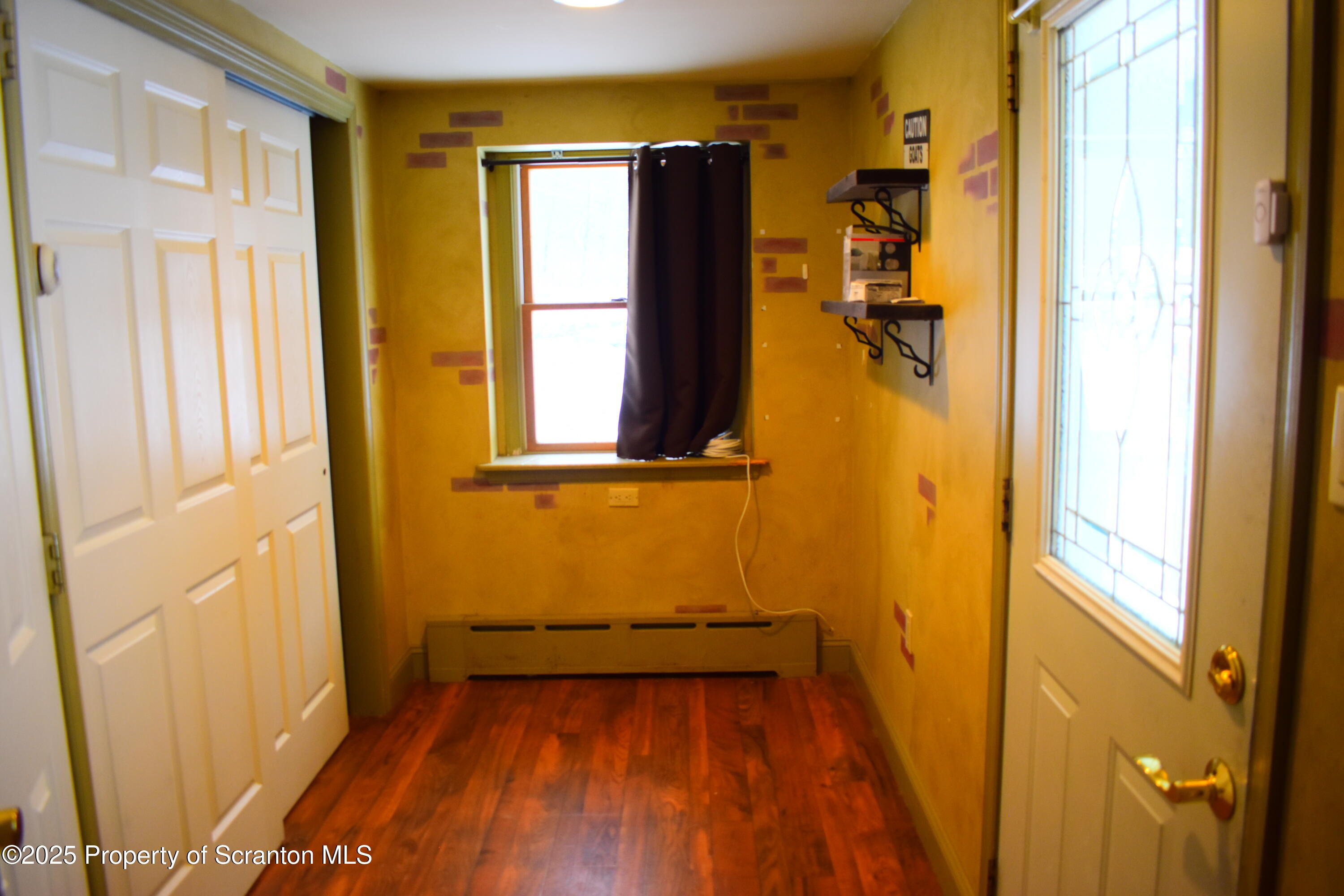 3003 Ridge Road Thompson, PA 18465 - Photo 13 of 33 wooden floor in a gallery next to a window